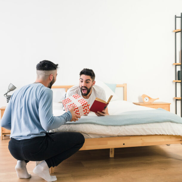 clean and comfortable boys PG room near NMIMS college with study table and bed