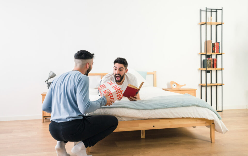 clean and comfortable boys PG room near NMIMS college with study table and bed